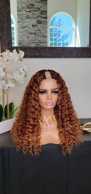100% Human hair curly U part wig colored.
